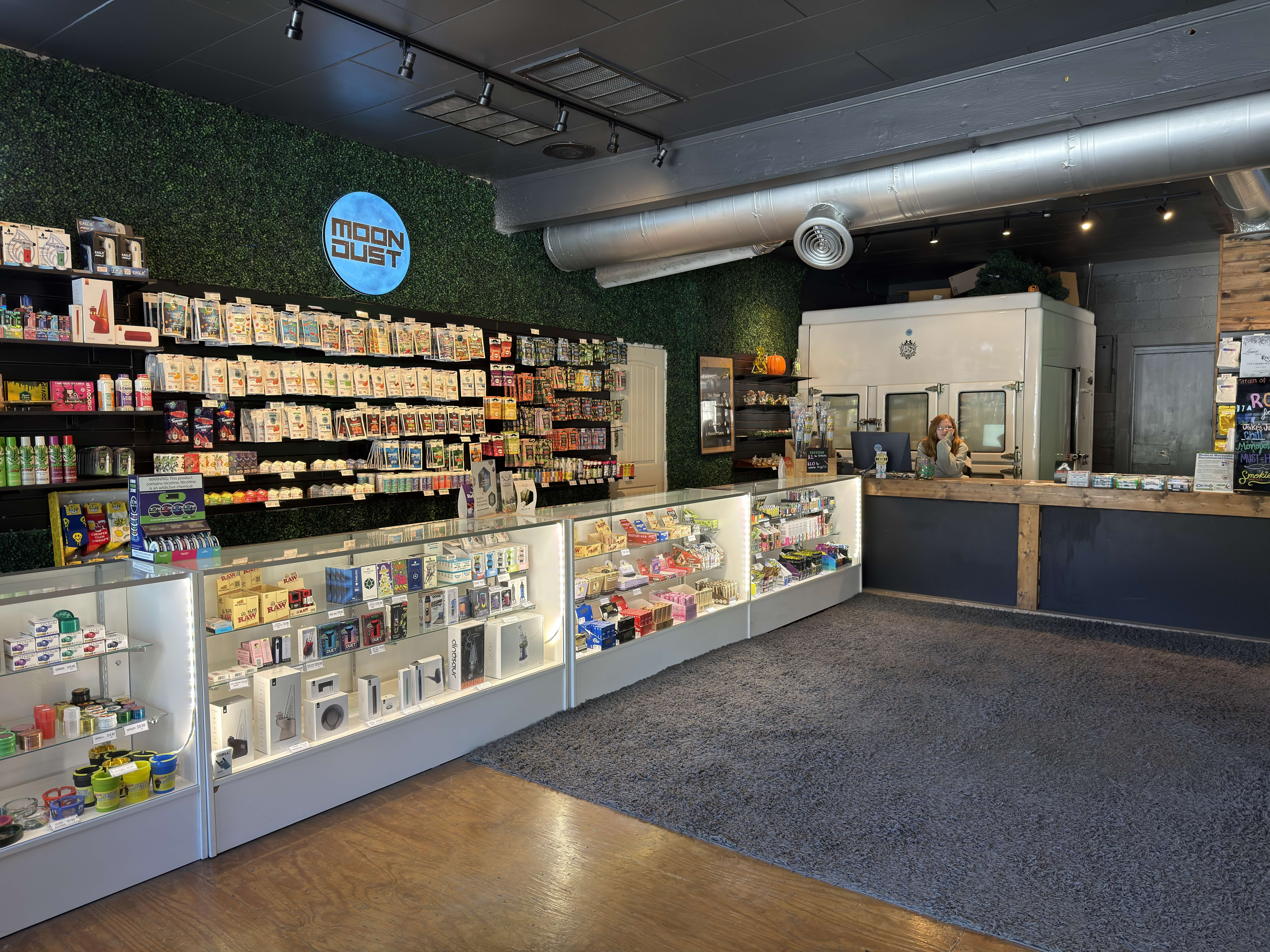 Signature Moon Dust wall featuring top-quality vapes and concentrates